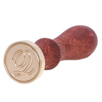 Wax seal stamp with letters of the alphabet - handwritten script Q