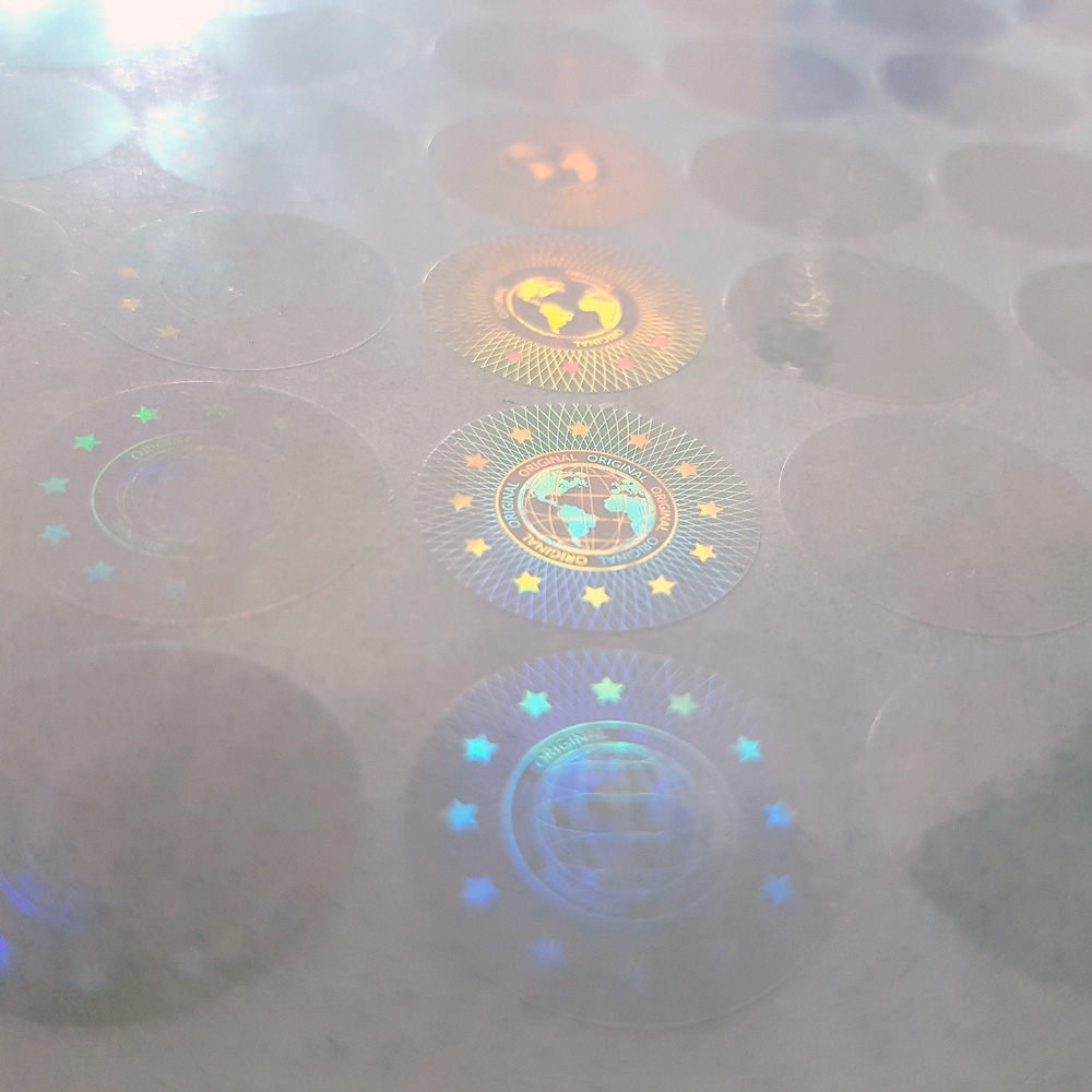 Original transparent hologram sticker, motive of a globe, 20 mm