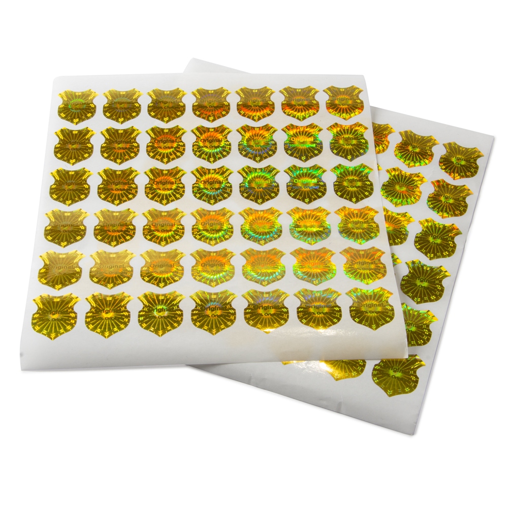 Original golden security sticker, 23 x 20 mm, Shield