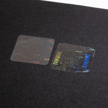 Transparent sealing film with a hidden hologram labels 20x20 mm
