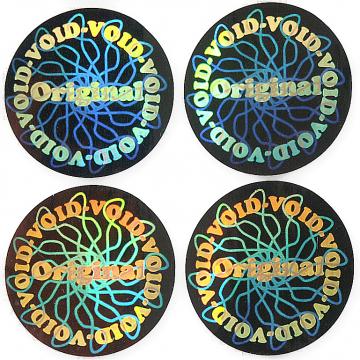 Two layered circular holographic seal with the title „Original“