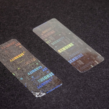 Transparent sealing film with a hidden hologram labels 45x17 mm